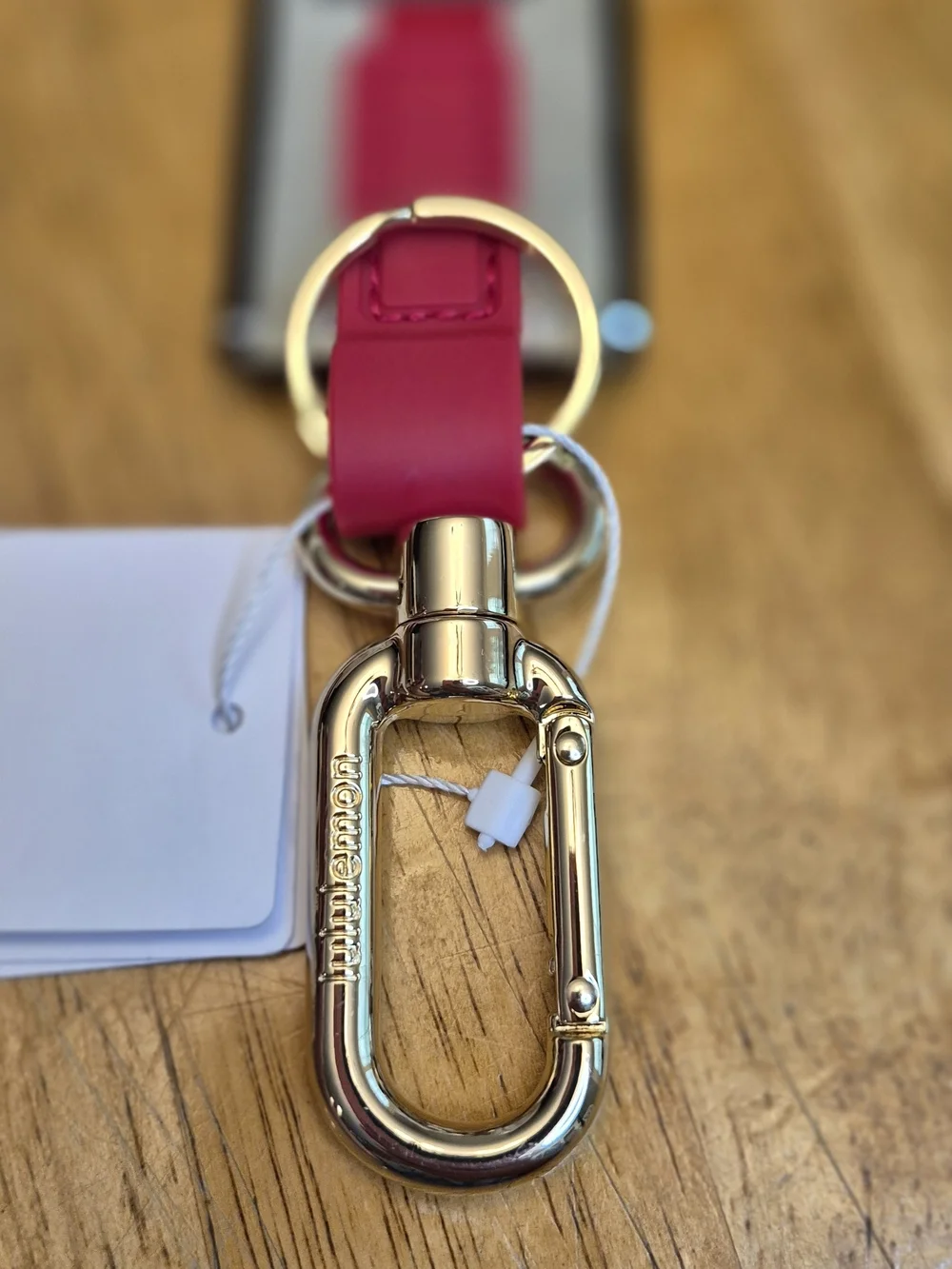 Lululemon Never Lost Keychain Wordmark Coconut Ivory Oxford Red Walnut Crunch